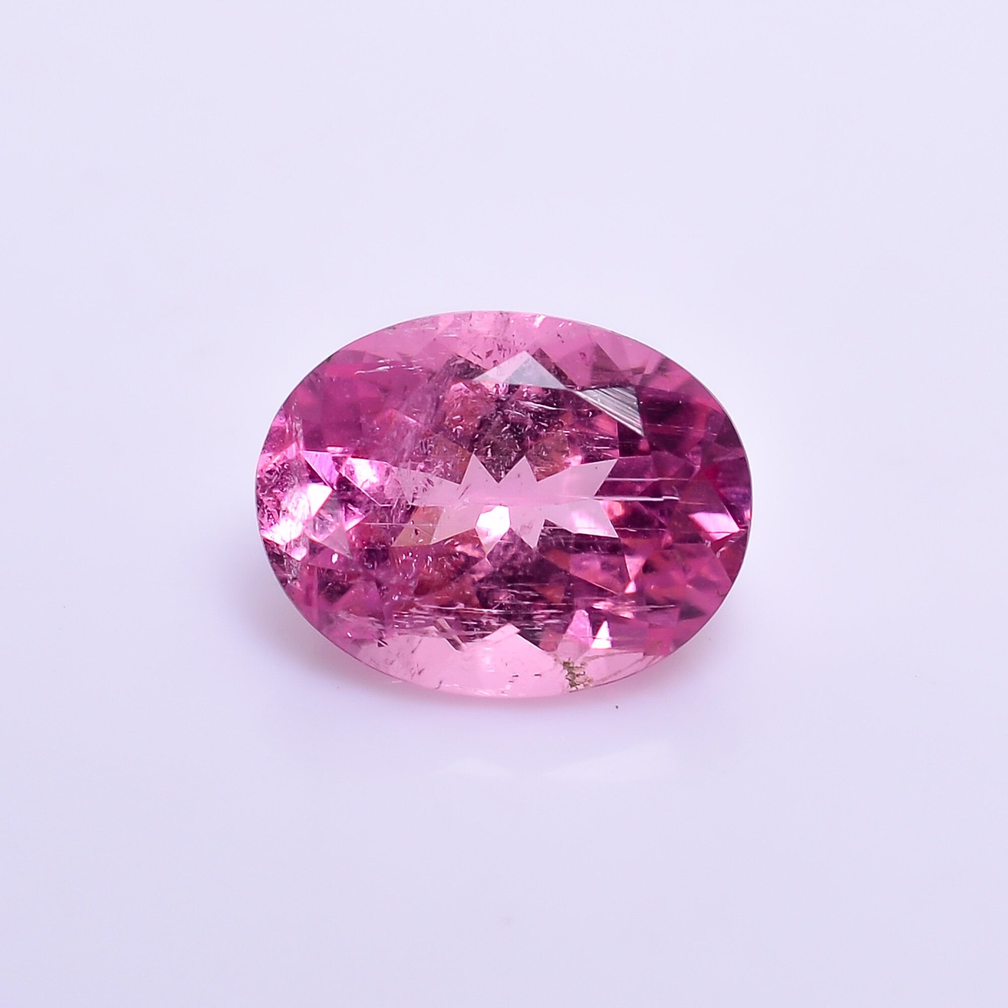 natural pink tourmaline oval shape facit cut stone slightly inclusion loose gemstone